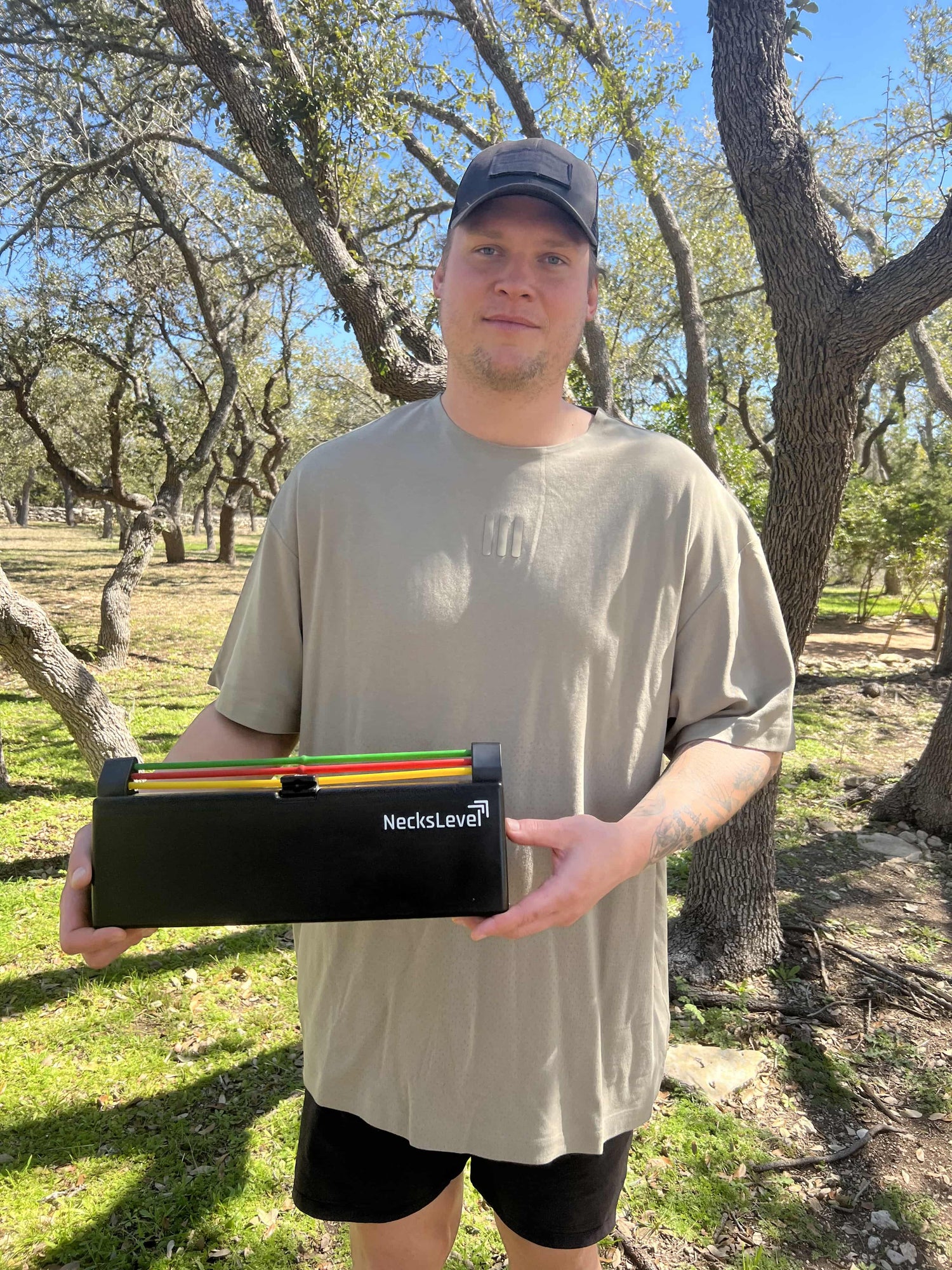 Brent Urban Football Player holding the NecksLevel Glide