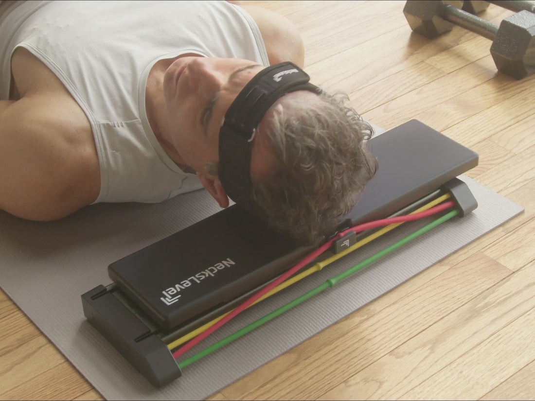 NecksLevel Glide pro in use doing resisted rotation on mat